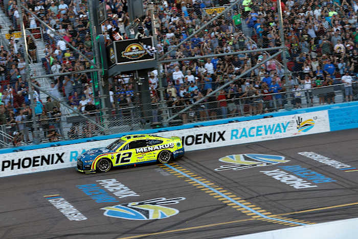 Ryan Blaney crosses the finish line to win the 2023 NASCAR Cup Series Championship, finishing first of the Championship 4 drivers Sunday at Phoenix Raceway. (Photo by Chris Graythen/Getty Images)